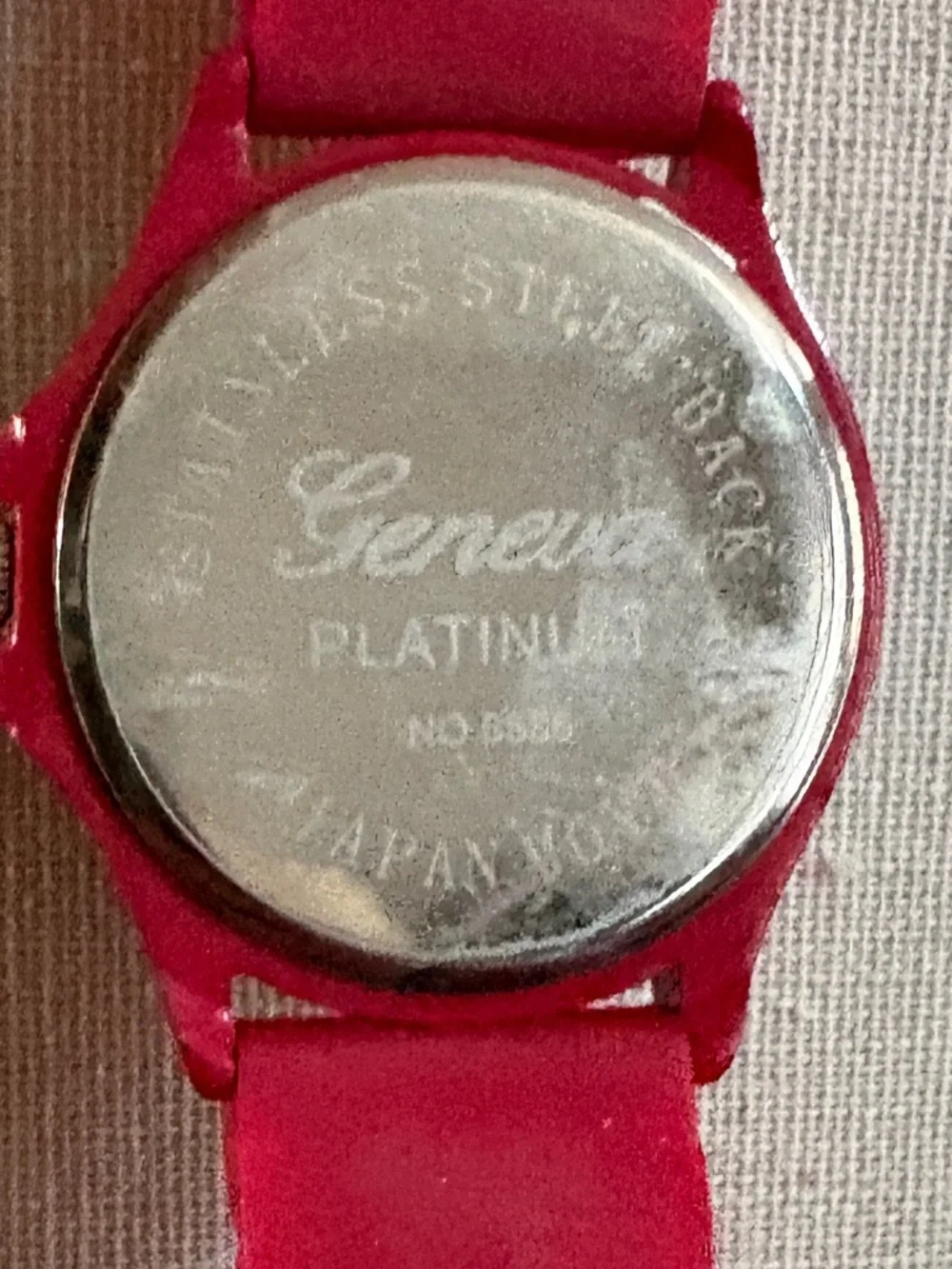 Geneva Platinum Red Dial Crystal Bezel Red Rubber Band Watch - needs Battery